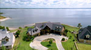 Stunning lakefront property in Kingston, Oklahoma on Lake Texoma. Featuring beautiful waterfront views, private docks, and luxurious lake homes for sale Texoma.